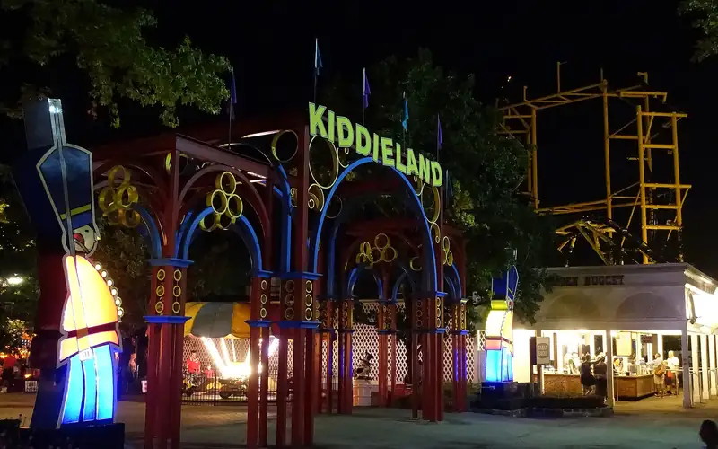 Kiddieland at Kennywood lit up at dusk
