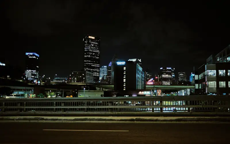 The Pittsburgh skyline lit up at night